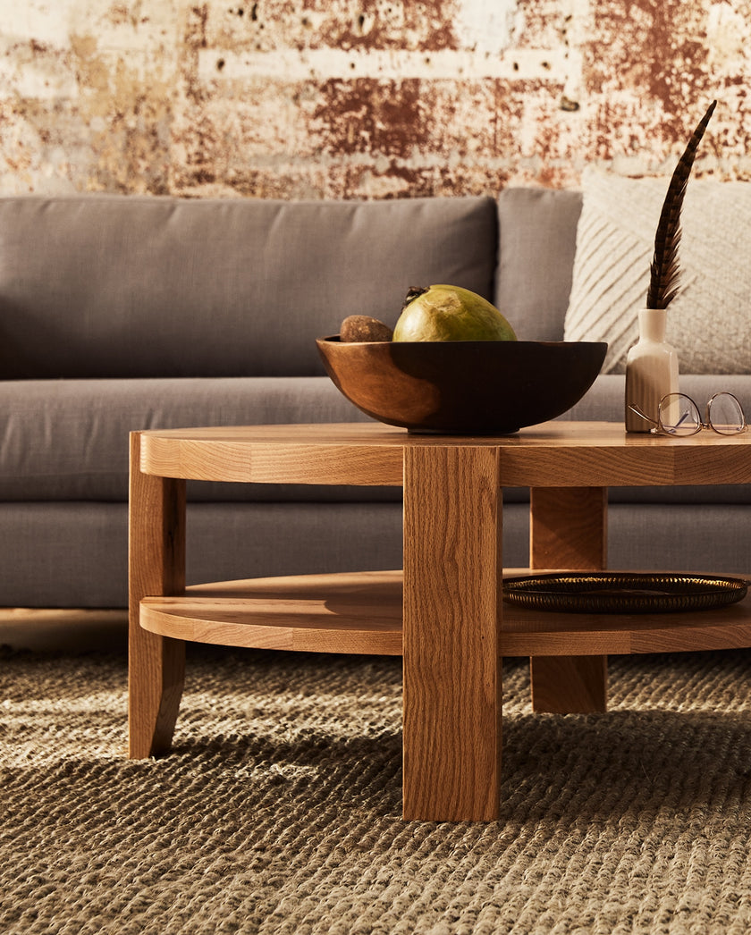 Room scene showcasing the Tavern Round Coffee Table
