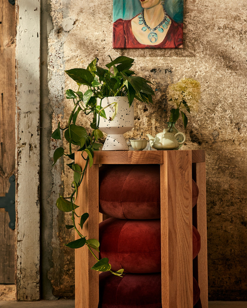 Room scene showcasing the Tavern Round Side Table